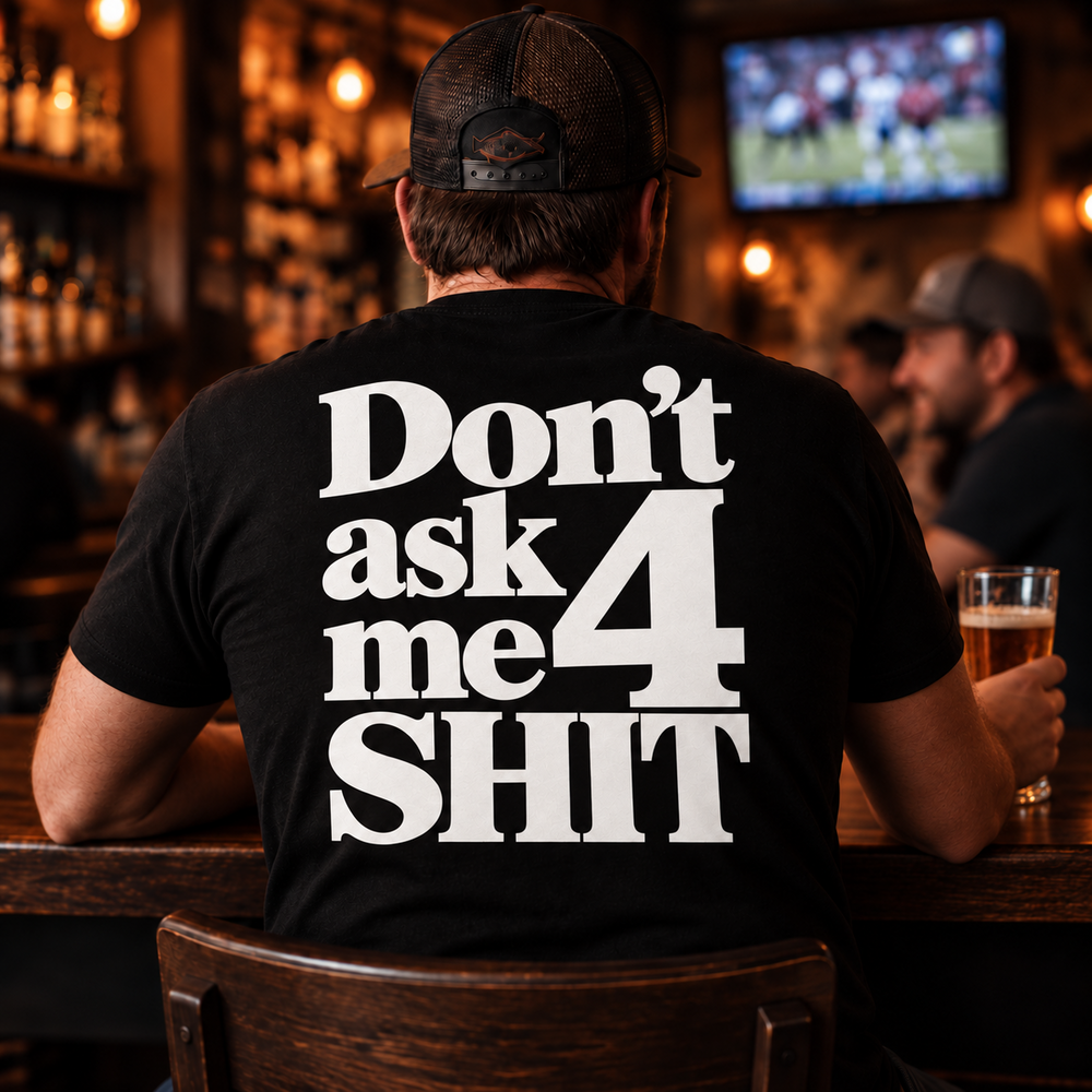 Man wearing Don't ask me 4 shit T-shirt at a bar